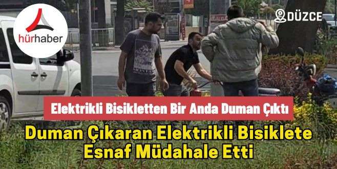 Duman çıkaran elektrikli bisiklete esnaf müdahale etti
