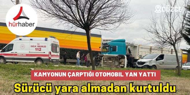 Kamyon ile çarpışan otomobil yan yattı