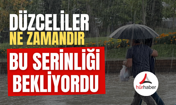 Yağmura sevindiler, yağış altında oynayarak serinlediler