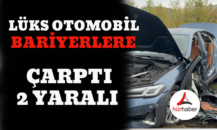Lüks otomobil bariyerlere çarptı 2 yaralı
